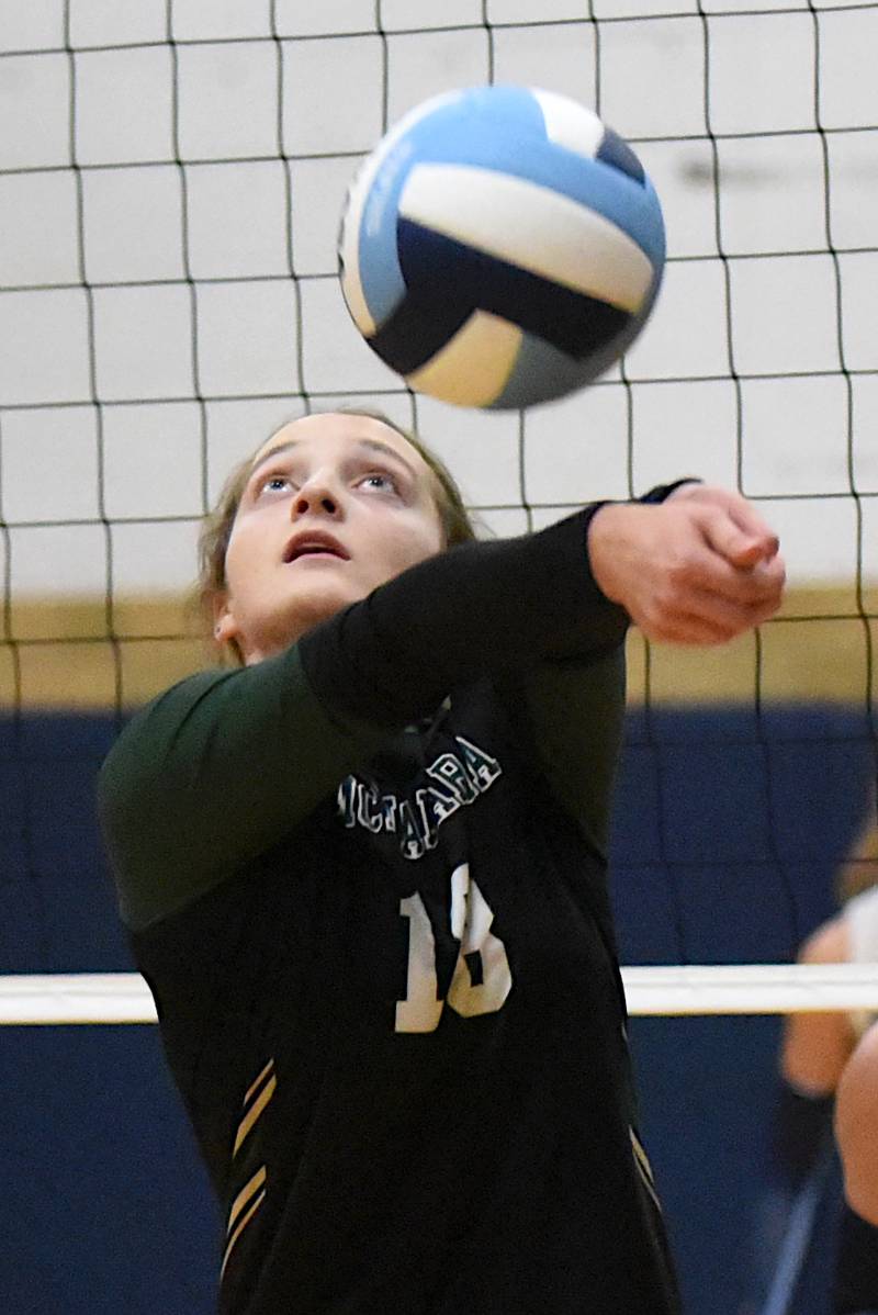 Bishop McNamara's Camille Czako bumps the ball during a game at Cissna Park Wednesday, Oct. 15, 2025.