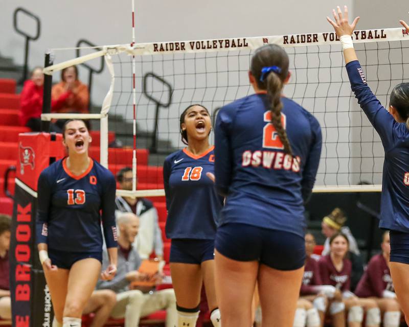 Oswego's Maya Norlin (18) celebrates a block for a point during Class 4A Bolingbrook Sectional final match between Lockport at Oswego.  Nov 7, 2024  in Bolingbrook.