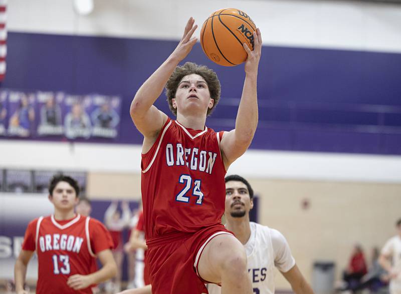 Oregon’s Ethan Peeling puts in a lay-up against Dixon Tuesday, Feb. 3, 2026.
