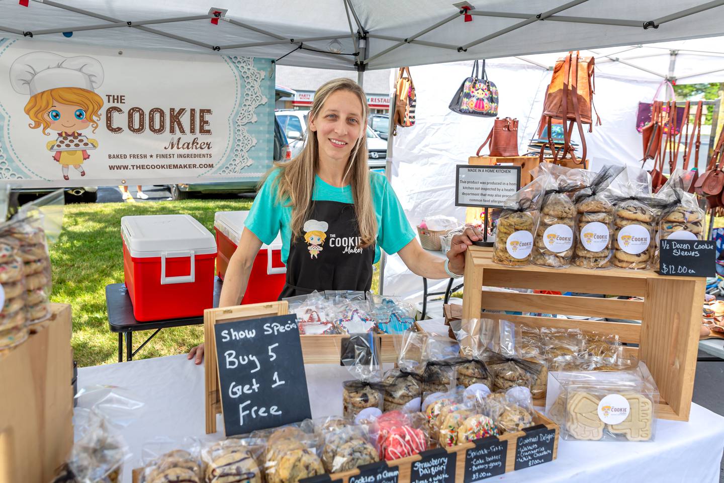 The Cookie Maker owner Heather Kratz at the Winfield Farmer's Market in Winfield, IL.  July 3rd, 2024.