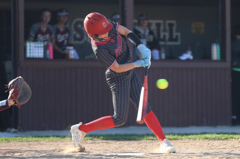 Ottawa’s Teagan Darif connects for a RBI double against Morris on Wednesday, April 8, 2026 in Morris.