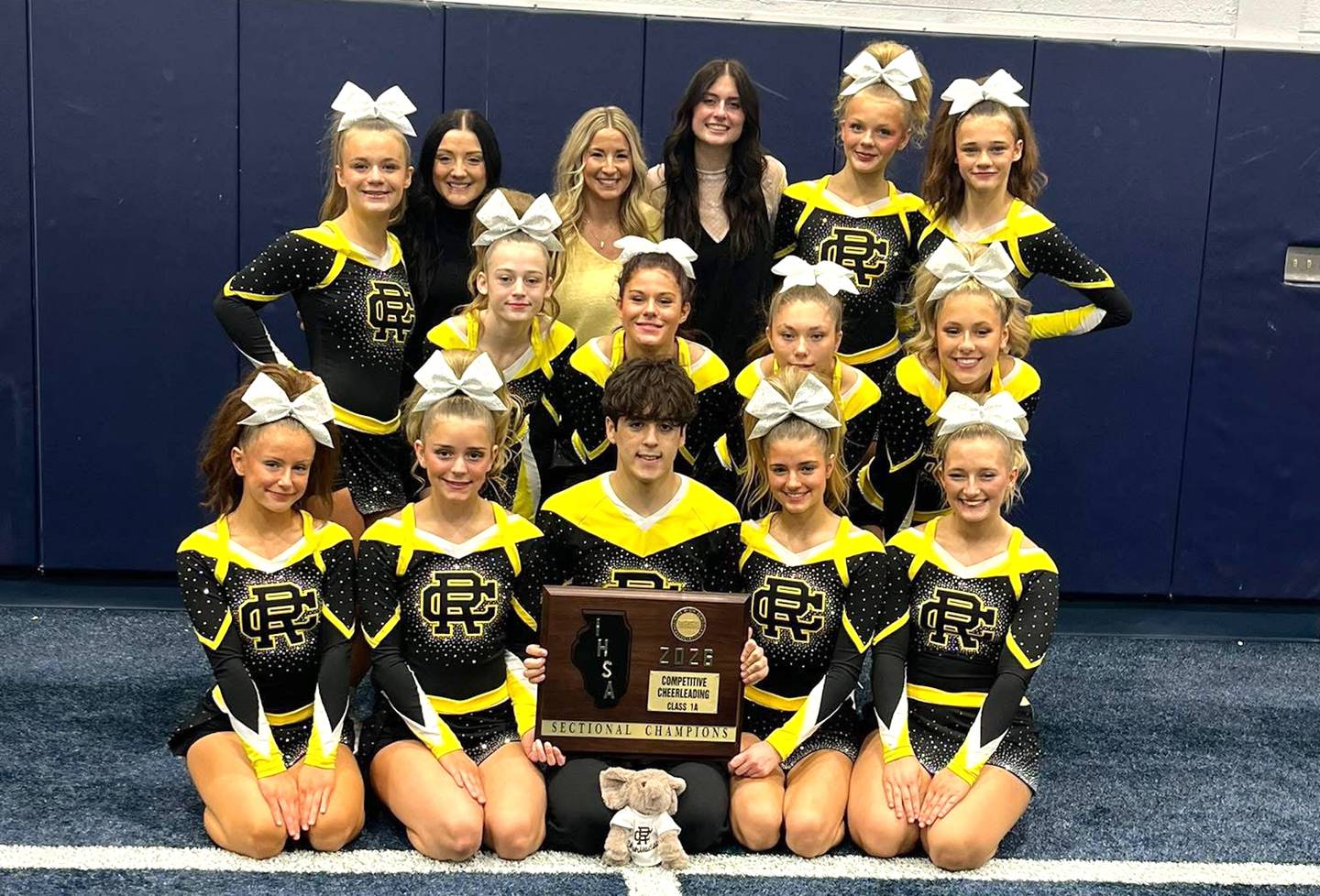 The Reed-Custer competitive cheer team won the Class 1A Reavis Sectional championship and competed in the IHSA State Finals last weekend in Bloomington. The team includes: in front – Evynn Wilbur, Kamryn Marschner, Roman Espinosa, Dionna Walker and Aubrey Harding; middle row – Kennedy Hartley, Brooklyn Alaimo, Emma Hopf and Caysie Esparza; and in back – Lily Castleberry, coach Destanie Nacey, coach Lexi Stewart, coach Jadyn Read, Aubree Bobzin and Alexandra Coyle.