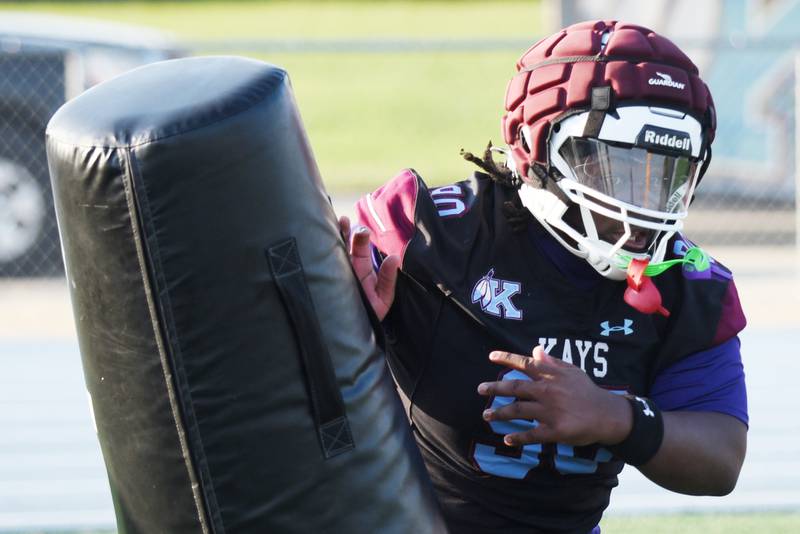 Kankakee's Camren Johnson works on a pass rush drill during practice Monday, Aug. 11, 2025.