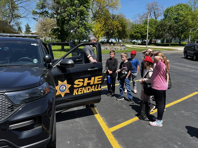 Newark Grade School participated in Camp 911 on May 9, a program begun in 2015 by retired Newark School District nurse Karen Sapsford. Firefighters and EMTs from the Newark Fire Department along with deputies from the Kendall County Sheriff's Office brought their equipment to show students, while nurses from Rush Copley Medical Center in Yorkville taught students first aid.
