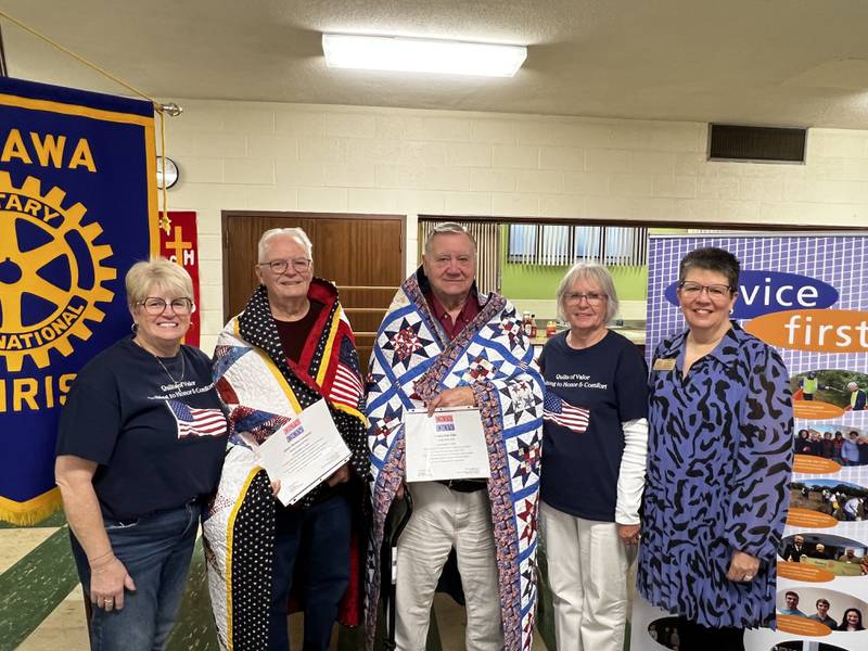 (From left) Mary Way, veteran quilt recipient Eldon Leemhuis, veteran quilt recipient Gene Enke, Jean McNelis and Terry Johnson, group leader of Illinois Valley Quilts of Valor, pose for a photo Friday, Nov. 15, 2024, after a Quilts of Valor presentation during an Ottawa Sunrise Rotary meeting.
