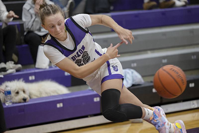 Dixon’s Katie Drew saves down a loose ball Wednesday, Nov. 30, 2022 against Ottawa.