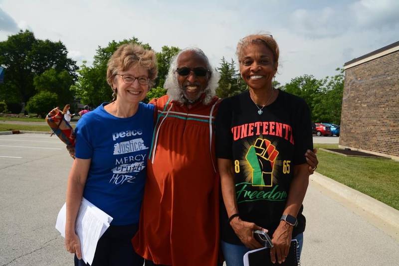 Sister Mary Jo Curtsinger (from left), Harold Gibson of CommUNITY Diversity Group of La Grange and Carolyn Sims Goddard celebrate Juneteenth.