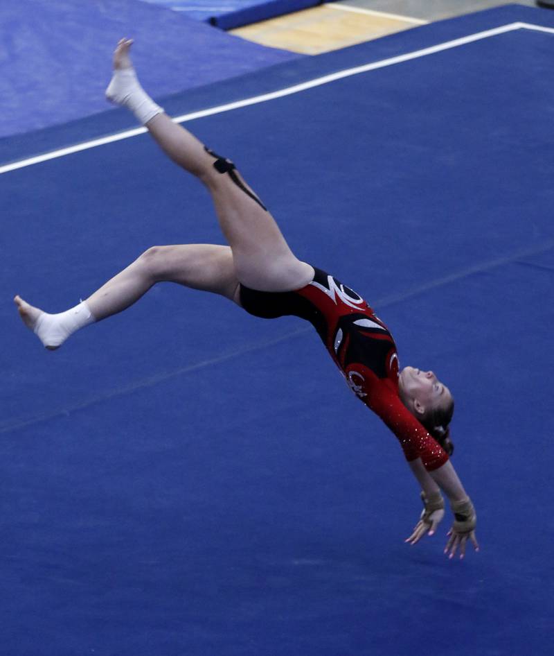 Palatine’s Jolee Waddington competes in the preliminary round of the floor exercise on Friday, Feb. 21, 2025, during the IHSA Girls State Final Gymnastics Meet at Palatine High School.