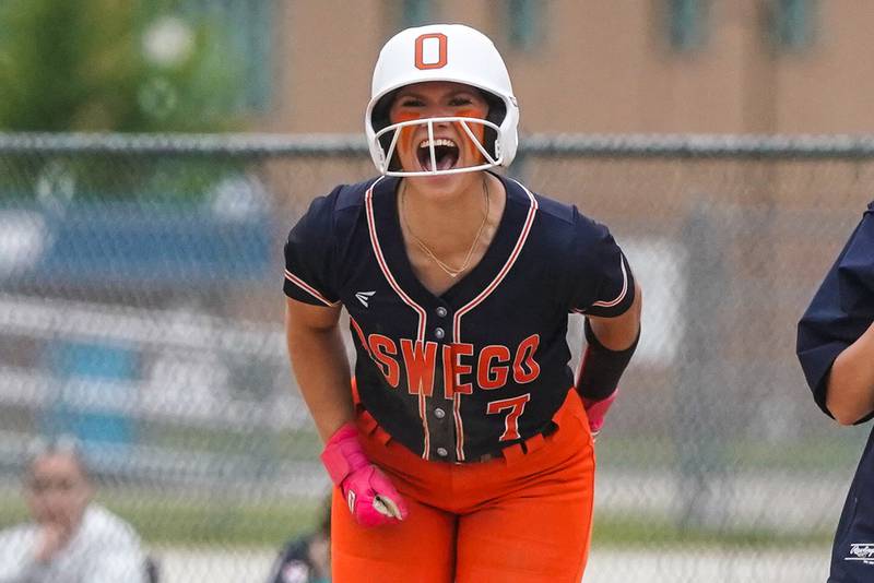 Oswego’s Bella Lisle (7) reacts after hitting a single against Neuqua Valley during a Class 4A Oswego East Regional Final softball game at Oswego East High School on Friday, May 30, 2025.