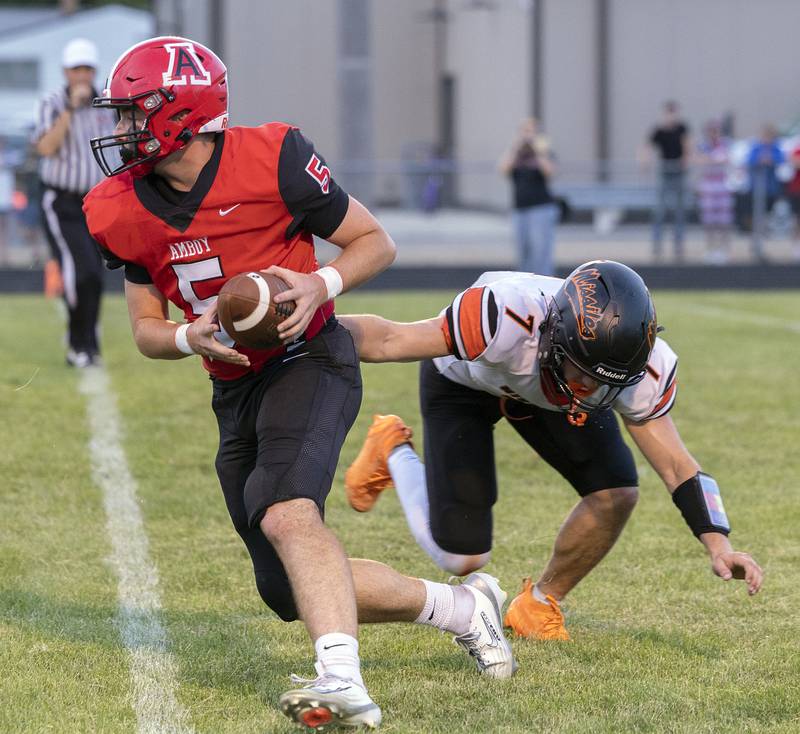 Amboy’s Rylan McNinch looks for running room against Milledgeville Friday, August 29, 2025, in Amboy.