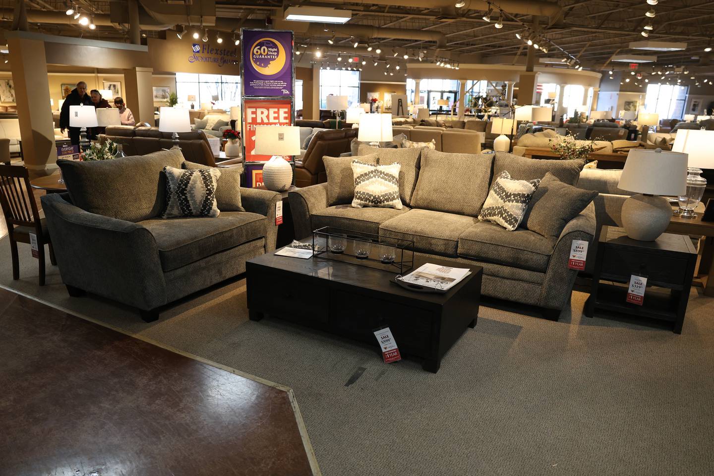 A living room setup sits in the showroom of Turk Furniture, who is celebrating their 140th anniversary. Wednesday, Dec. 17, 2025 in Joliet.