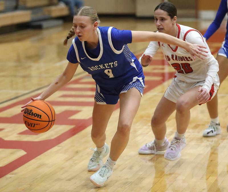 Burlington Central's Ashley Waslo brings the ball up the court against Huntley's Alyssa Borzych during a Fox Valley Conference girls basketball game on Tuesday Jan. 13, 2026, at Huntley High School.