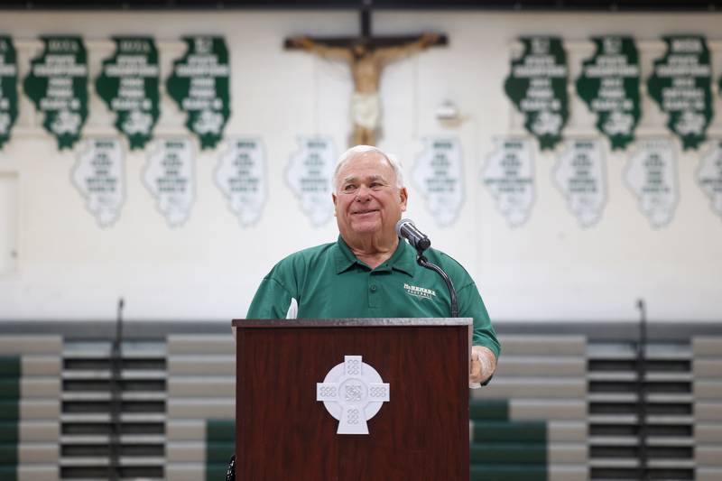 Longtime Bishop McNamara football coach Rich Zinanni speaks to the crowd during the ribbon-cutting ceremony for the school's new Rich Zinanni Athletic Complex on Thursday, Aug. 21, 2025.