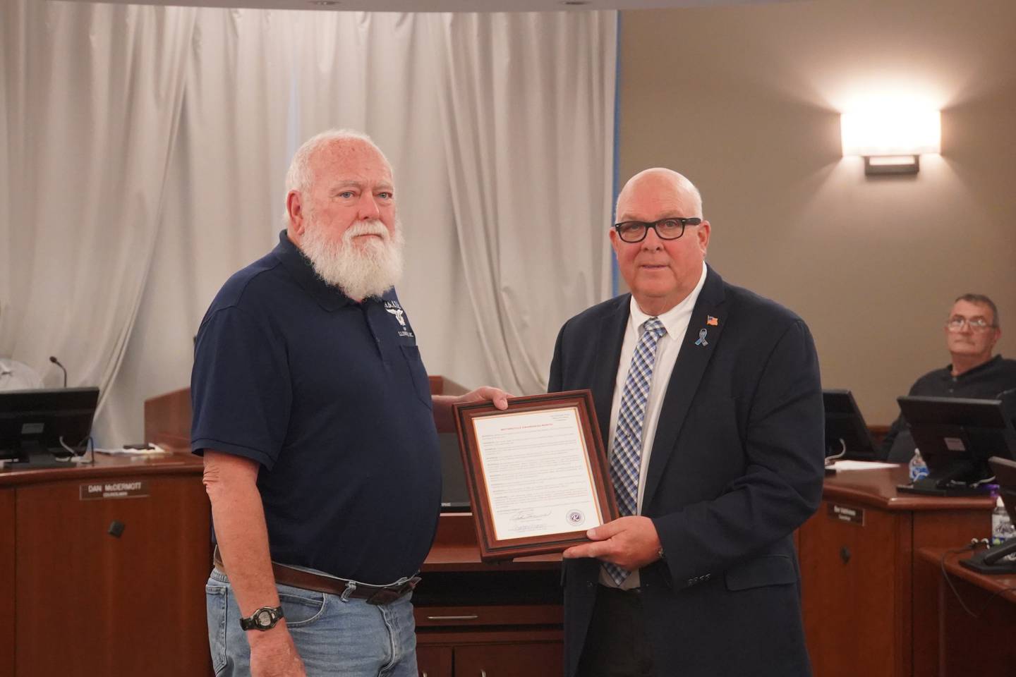 At the Monday, April 27, meeting of the Rochelle City Council, Mayor John Bearrows (right) read a proclamation in honor of Motorcycle Awareness Month in May.