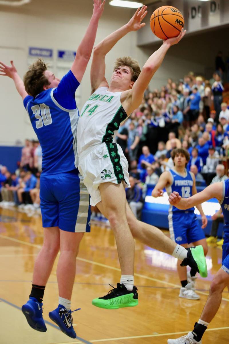 Seneca's Cameron Shirley twists and shoots in Friday's regional championship at Princeton. The Tigers won 59-53 to claim their fourth straight regional title.
