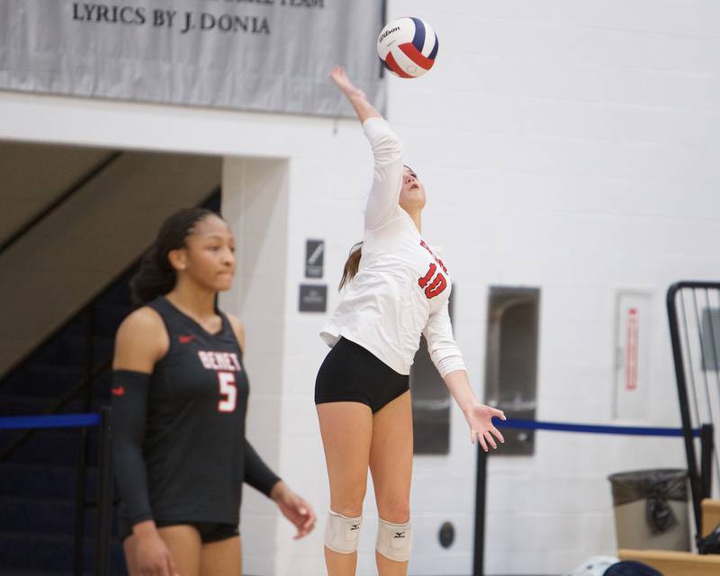 Benet's Claire Weathers serves the ball against St. Charles North on Monday, Oct. 6, 2025 in St. Charles.