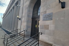 Justice Department sues for access to Illinois voter rolls