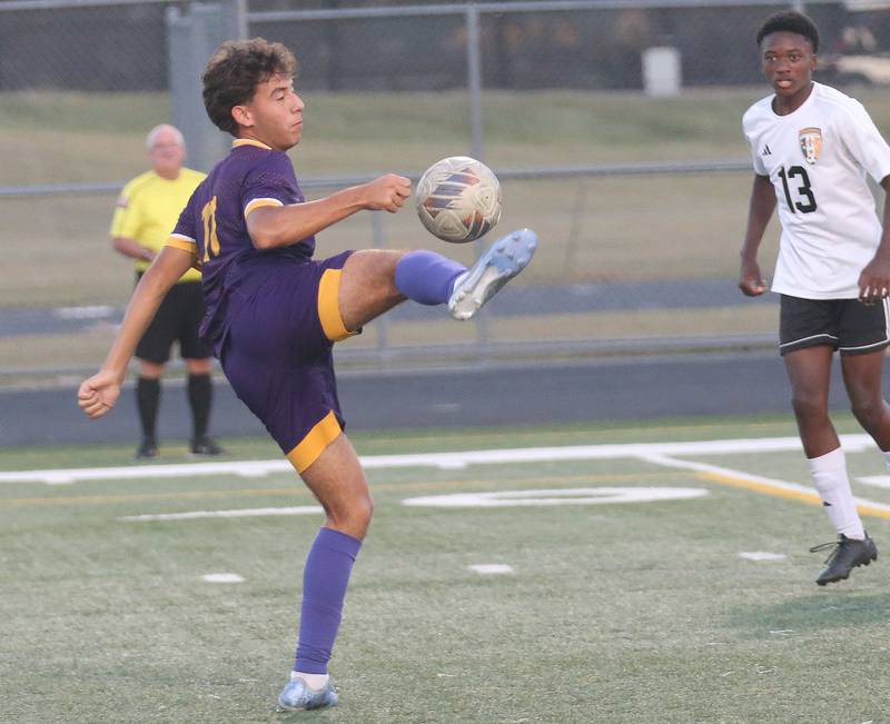 Mendota's Cesar Casas knocks the ball down against Kewanee during the Three Rivers Tournament on Thursday, Oct. 2, 2025 at Mendota High School.