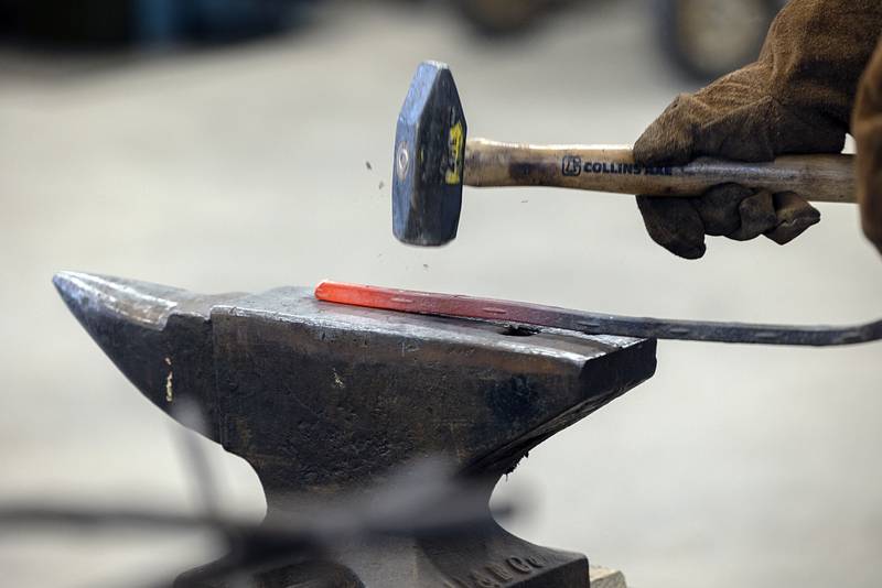 The next step in building a memorial from the metal taken from the Rock River is to straighten the pieces, then weld them into the cross.