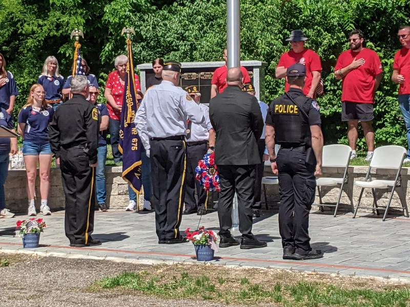 A wreath is laid at a Memorial Day ceremony at the Oswego Township Cemetery on Monday, May 25, 2026.
