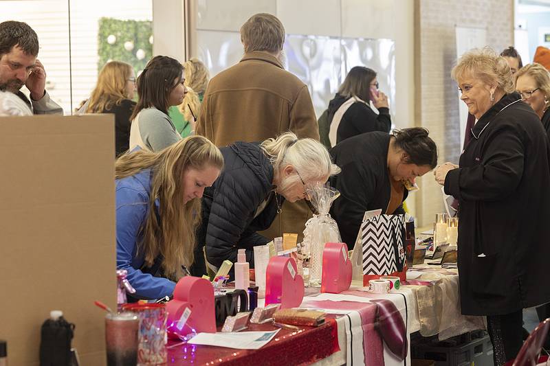 Customers visit the Mary Kay booth Sunday, Feb. 2, 2025, at the Sauk Valley Wedding Expo in Sterling.