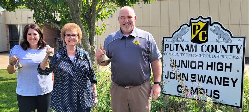 Social Studies teacher, Jessica Lankaitis (left), joins Chief Senachwine DAR Chapter Regent, Sharon Bittner, and Putnam County Junior High, Swaney campus, Principal, Michael Olson, in ringing bells for the start of Constitution Week Sept. 17-23.
