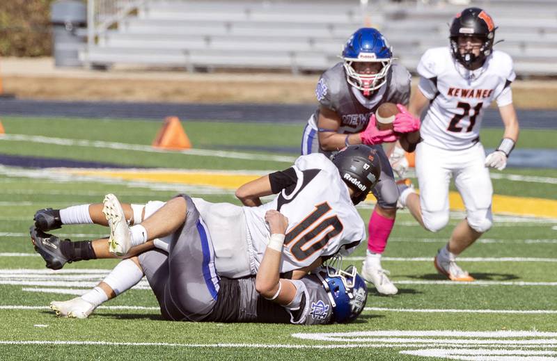 A tipped ball drops into the hands of Newman’s Rylan Alvarado for an interception against Kewanee Saturday, Oct. 18, 2025.