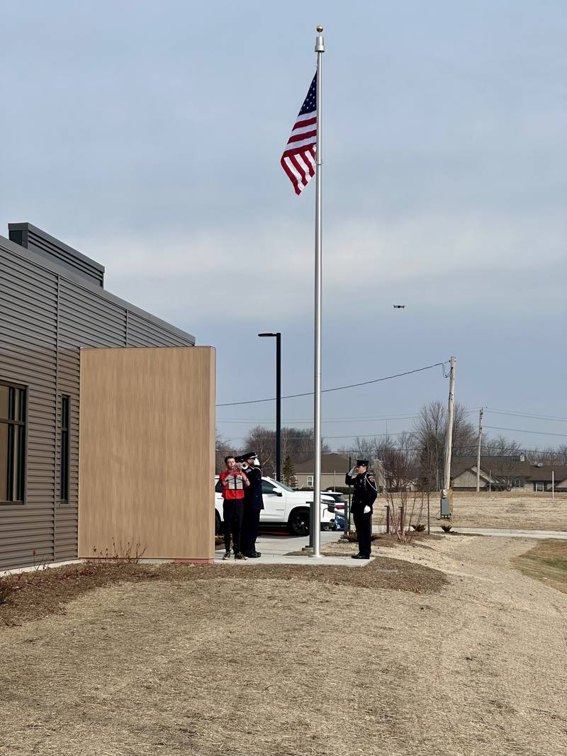 Sycamore firefighters at a flag ceremony on Tuesday, Feb. 17, 2026, to mark the opening of the Sycamore Fire Department's new fire station, 1351 S. Prairie Drive.  The station will replace the aging building at 535 DeKalb Ave.