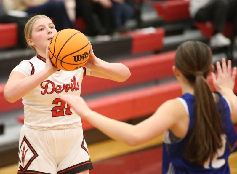 Hall's Ava Delphi looks to shoot a jump shot over Princeton's Avaya Koning on Monday, Jan. 6, 2025 at Hall High School.