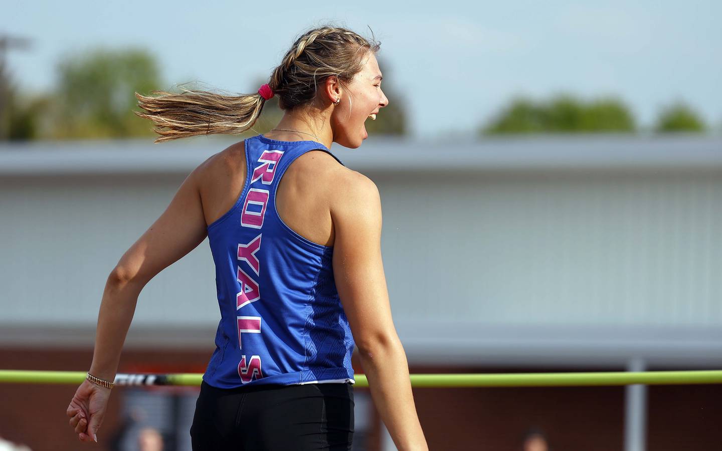 Katie Kostro of Rosary reacts after competing in the high jump during the Kane County girls track and field meet at East Aurora High School Friday, May 2, 2025 in Aurora Ill. Kostro took first.