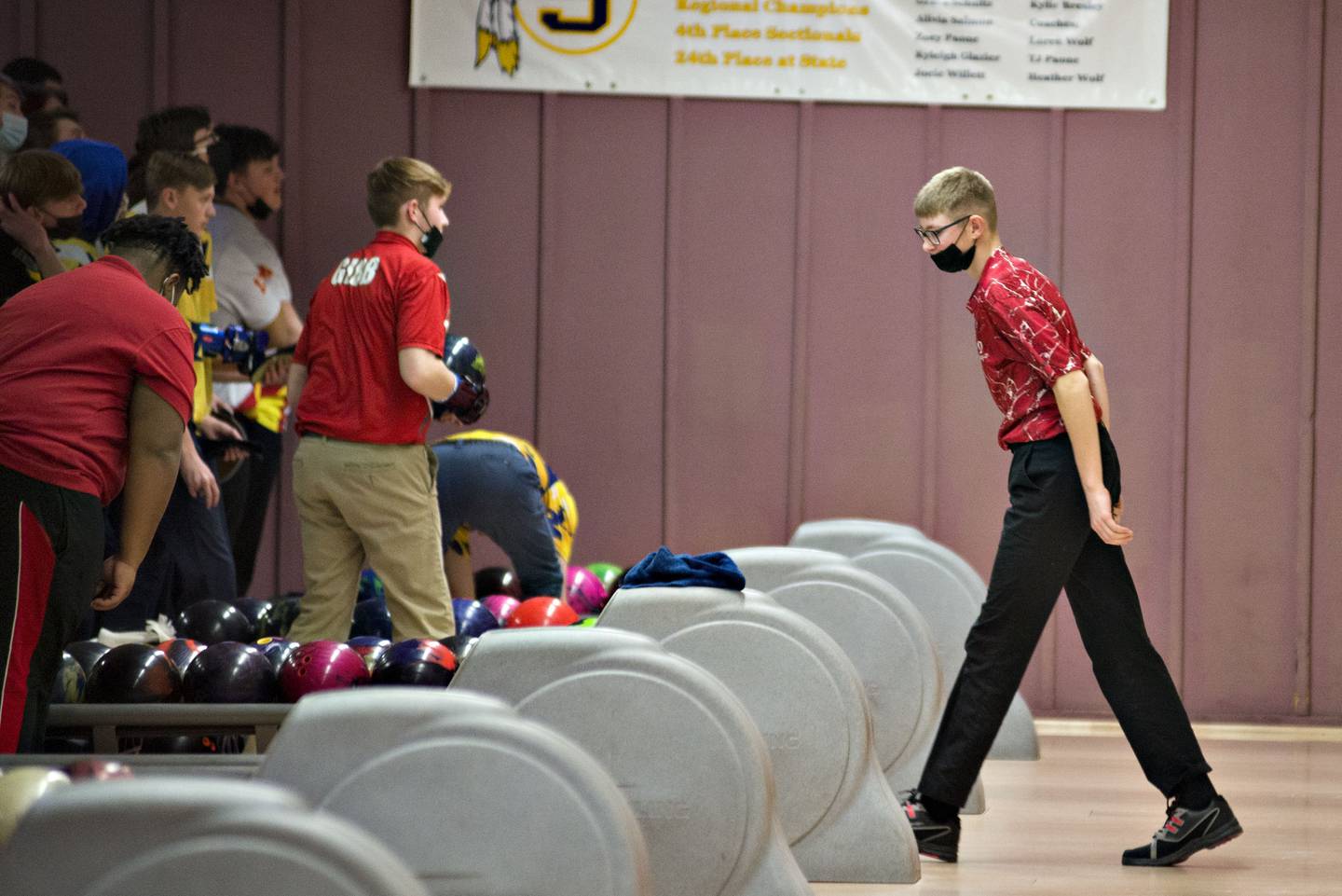 Oregon's Isaac Kaltenbrun celebrates a strike during bowling regionals in Sterling on Saturday, Jan. 15, 2022.