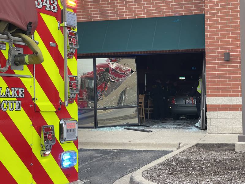 A vehicle inside the Wings and Rings in Crystal Lake after it crashed into the restaurant on Thursday evening, March 23, 2023.