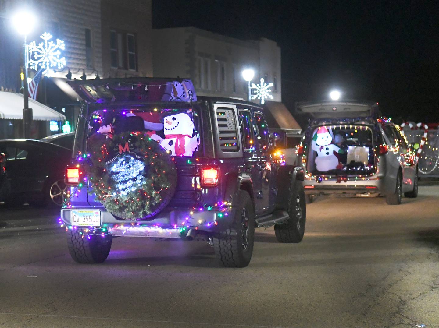 Several vehicles took part in the lighted parade at the start of Mt. Morris' Festival of Lights on Dec.3.