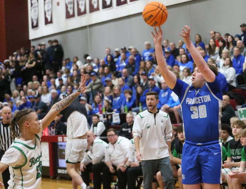 Princeton's Jordan Reinhardt lets go of a shot over Rock Falls's Kam Hicks during the Class 2A Sectional final on Friday, March 7, 2025 at Marengo High School.