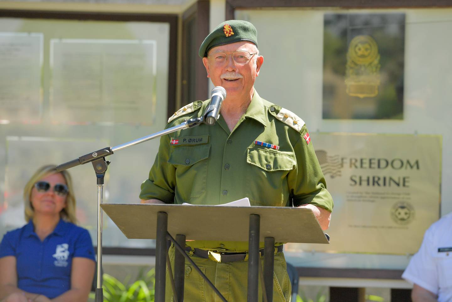 t. Charles Memorial Day Ceremony keynote speaker Peter Orum, Danish military veteran, speaks of his gratitude to the U.S. and British armed forces who freed his native Denmark from the Nazis, allowing him to grow up free.