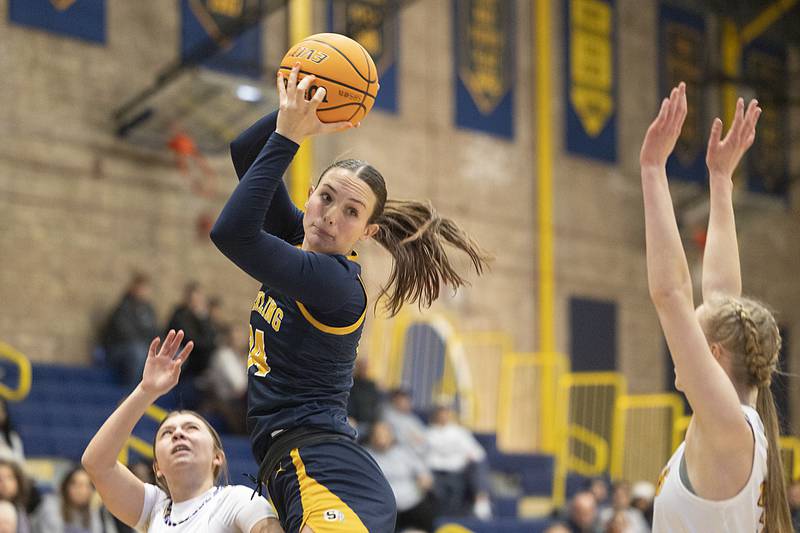 Sterling’s Madison Austin pull down a rebound against Hononegah Saturday, Dec. 21, 2024, during the Sterling Shootout.