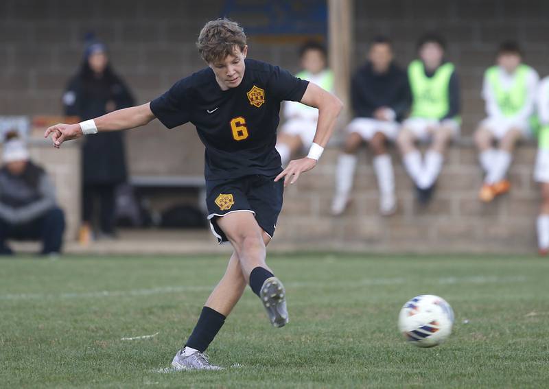 Richmond-Burton's Brayden Mumbower takes a penalty kick to score Richmond-Burton’s only goal during an IHSA Class 1A Johnsburg Sectional semifinal match against F.W. Parker on Oct. 28, 2025, at Johnsburg High School.