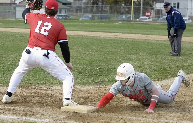 Ottawa’s Jace Veith beats the tag from Streator’s Cole Winterrowd on a pickoff move at 1st base Thursday at Streator.