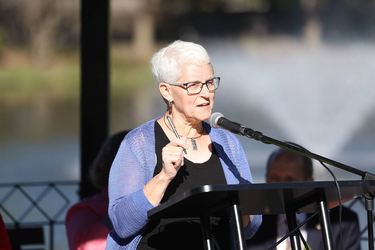 Arborist Rita Renwick speaks at the rededication of the Gardens and Arbors along North 129th Infantry Drive on Tuesday, Oct. 8, 2024 in Joliet.