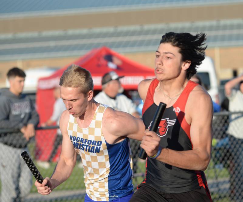 Forreston's Jonathan Milnes runs with the baton in the 4x200 relay at the 1A Oregon Sectional at Landers-Loomis Field on Friday, May 23, 2025. Milnes, Brody Schwartz, Eli Ferris, and Noah Dewey won the race and advanced to the state meet at Eastern Illinois University on Thursday, May 29.