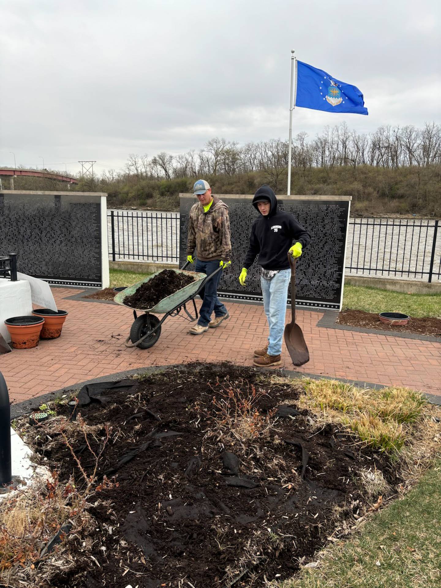 Laborers Local Union 393 members participated in the spring beautification project at the Middle East Conflicts Wall Memorial, cleaning out old mulch and installing new mulch, trimming trees and replacing old flowers.