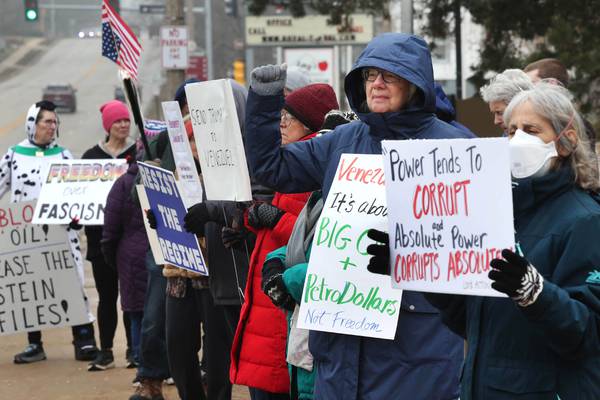 Photos: Protesters gather in DeKalb to voice opposition to recent actions in Venezuela