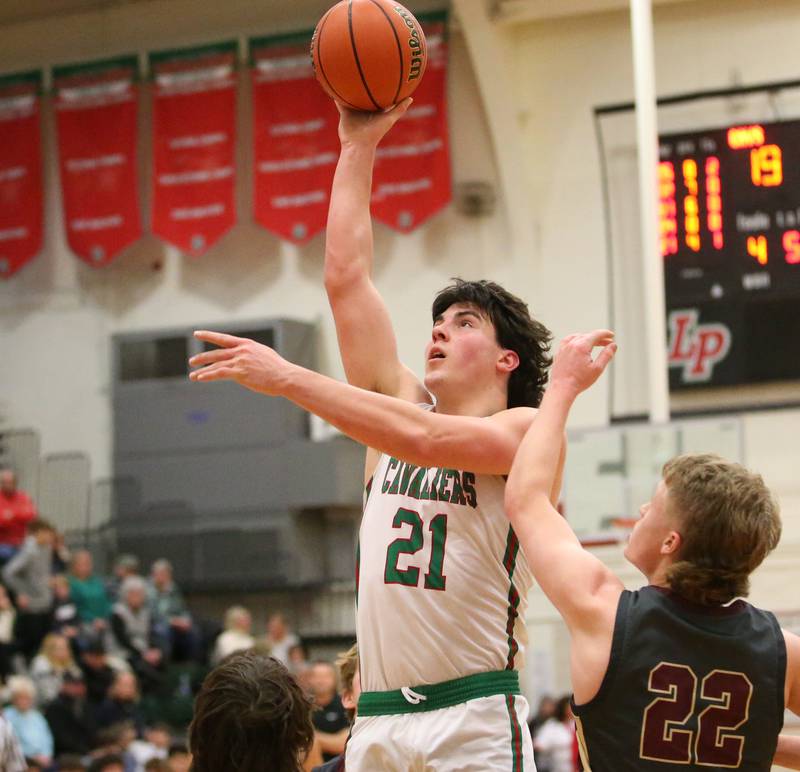 L-P's Josh Senica shoots a shot over Morris's Gage Phillips in Sellett Gymnasium on Friday, Jan. 13, 2023 at L-P High School.