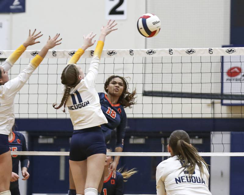 Oswego's Maya Norlin (18) spikes the ball during Class 4A Regional Final volleyball match between Neuqua Valley at Oswego. Oct 30, 2025 in Plainfield.