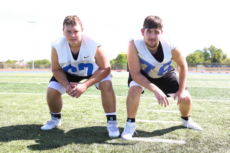 Lincoln-Way East’s starting linemen Josh Janowski, 67, and Brad Abbott, 76, look to provide time for the QB and holes for the running game. Tuesday, Aug. 9, 2022, in Frankfort.