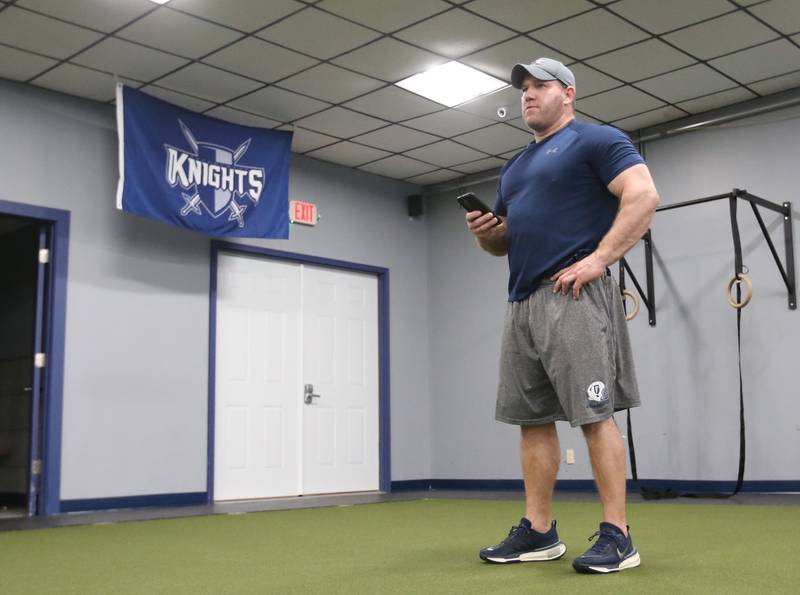 Justin Arndt Champaign firefighter and owner of Knight Fitness holds a training program for the Fieldcrest Knights football team on Wednesday, April 17, 2024 at Knight Fitness in Minonk.