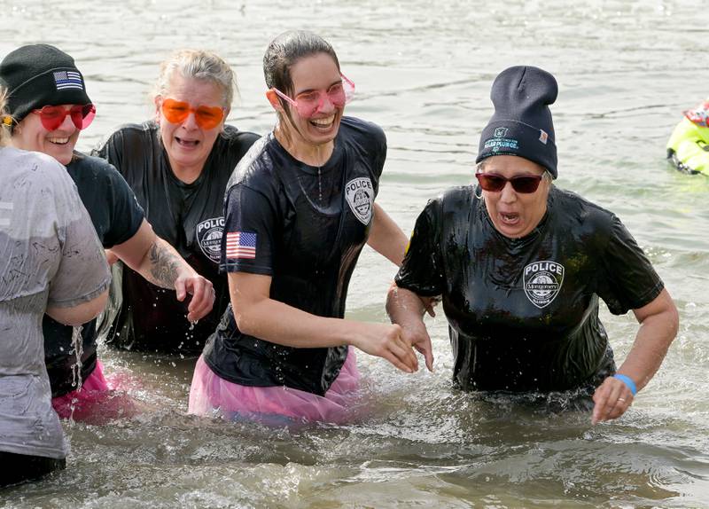 A team from the Montgomery Police Department take part in the Law Enforcement Torch Run Polar Plunge for Special Olympics Illinois Athletes at Silver Springs State Park on Sunday, Mar 1, 2026 in Yorkville.