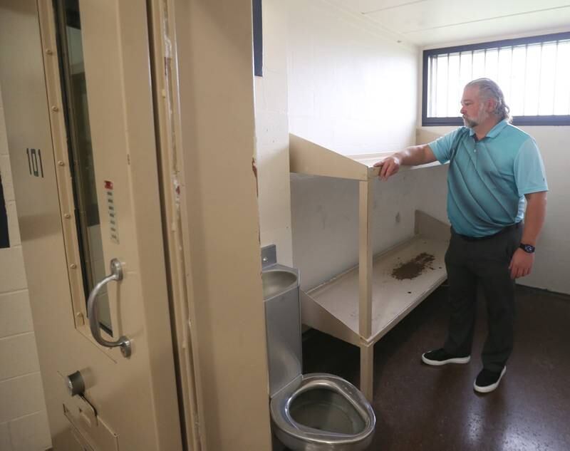 Jason Edgcomb, La Salle County Fail Superintendent, poses for a photo inside a vacant jail cell on Thursday, Oct. 26, 2023 at the La Salle County Jail in Ottawa. The new SAFE-T Act made Illinois a no-cash bail state allowing for staffing reductions. The correction officers at the La Salle County Jail can rest easy that no one will be laid off.