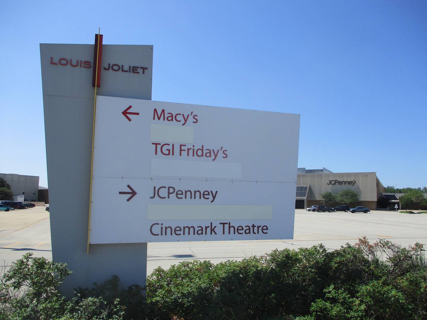 A sign directs visitors to some of the main attractions at the Louis Joliet Mall, including its two remaining anchor stores – Macy's and JCPenney. Joliet. July 9, 2023.