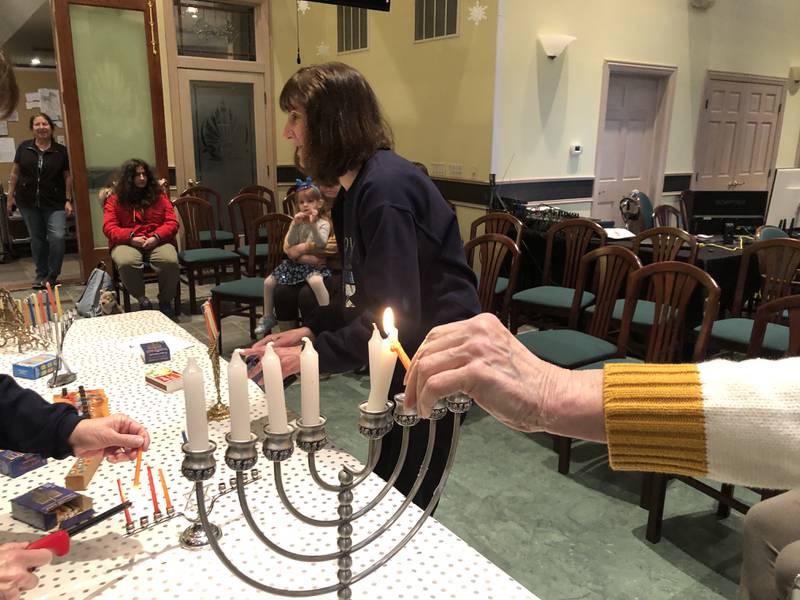 On Sunday, Dec. 29, 2024, Rabbi Maralee Gordon lights one candle of a Hanukkah menorah at its new home at 5603 Bull Valley Rd, McHenry, Hanukkah began on Dec. 25, and ends January 2.
